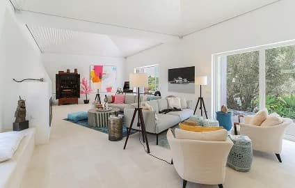 Open-plan villa living room with designer furniture