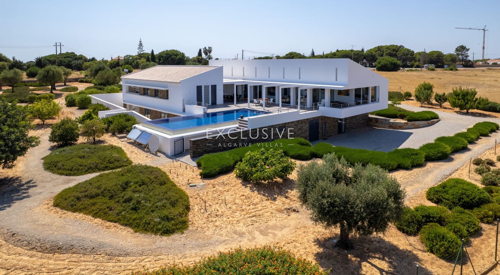Design villa in the Caramujeira with panoramic coastal views-1